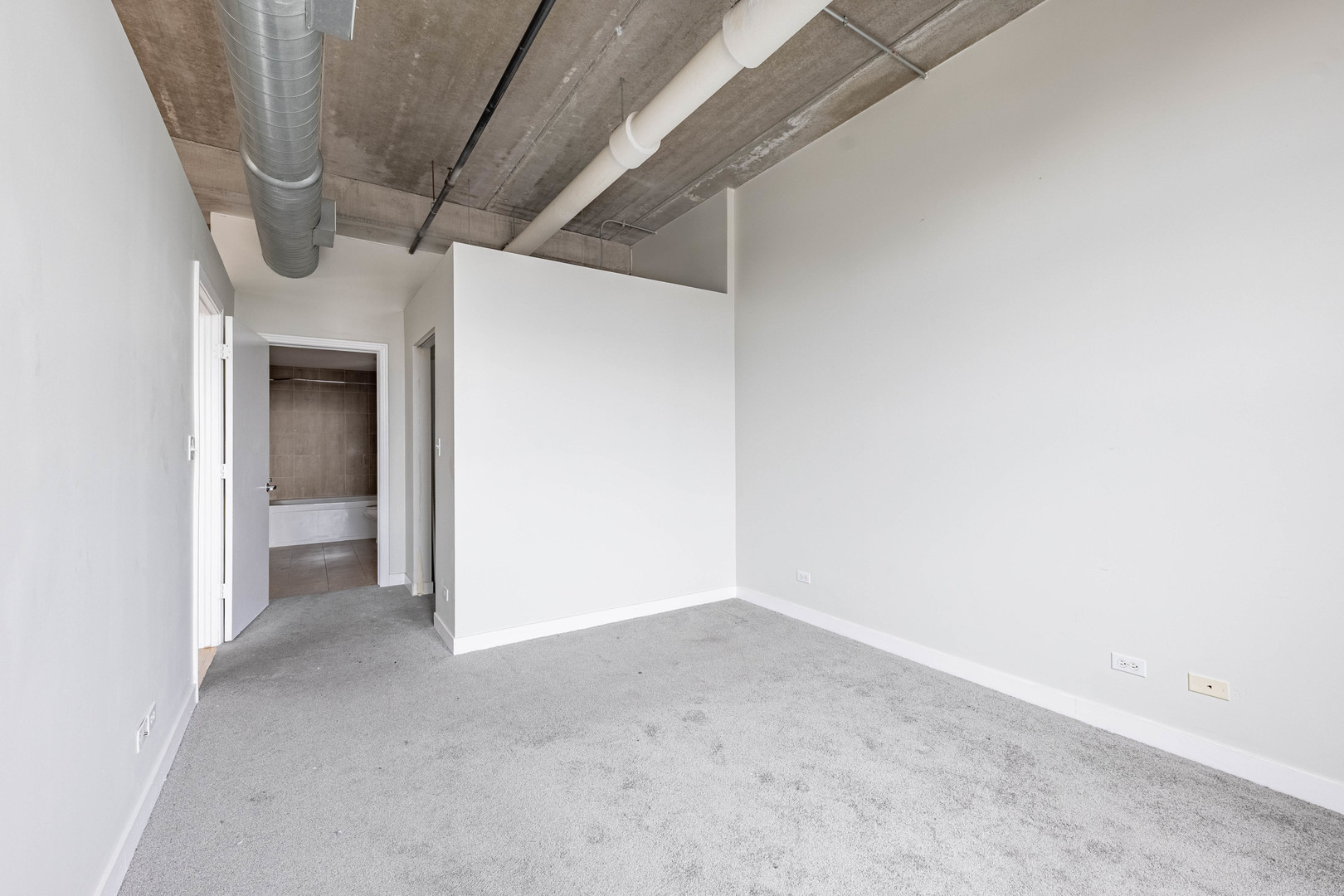 811 West 15th Place, Unit 806 Chicago, IL 60608 - Photo 12 of 35 a view of a room with a hallway