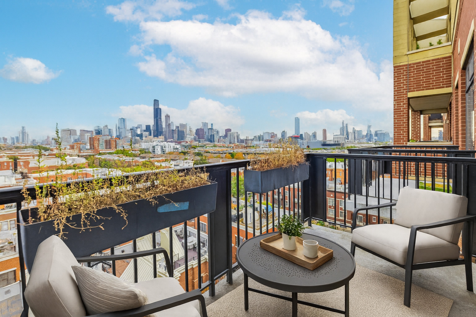 811 West 15th Place, Unit 806 Chicago, IL 60608 - Photo 22 of 35 a view of a chairs and table on the terrace