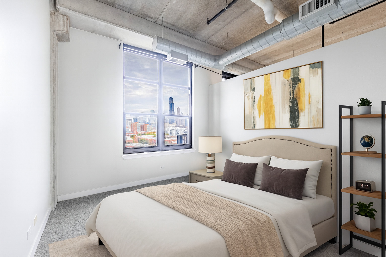 811 West 15th Place, Unit 806 Chicago, IL 60608 - Photo 9 of 35 a bedroom with a bed and a window