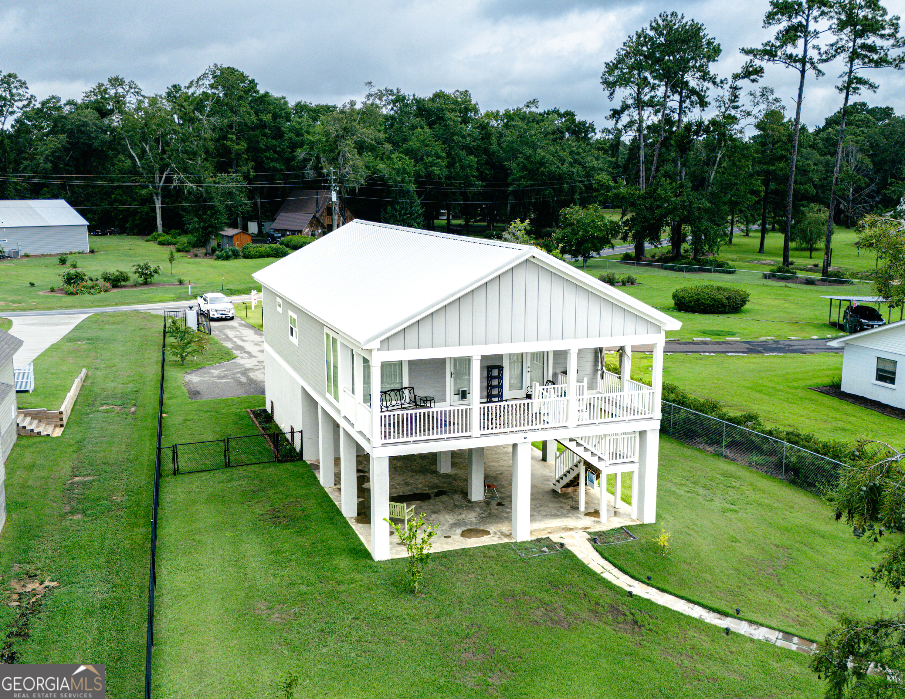 475 Cedar Creek Road North Cordele, GA 31015 - Photo 14 of 50 a aerial view of a house with a yard