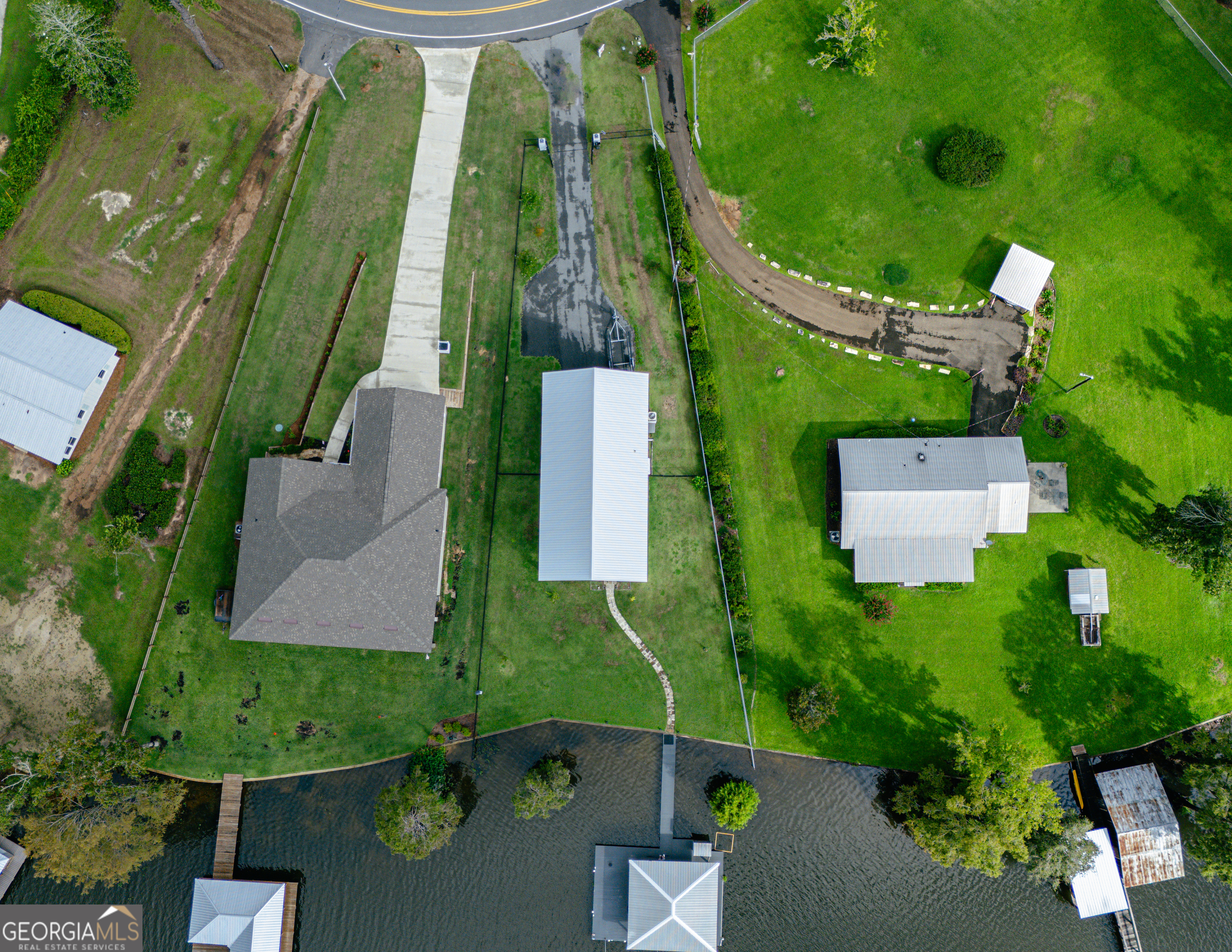 475 Cedar Creek Road North Cordele, GA 31015 - Photo 15 of 50 an aerial view of a residential houses with outdoor space and street view