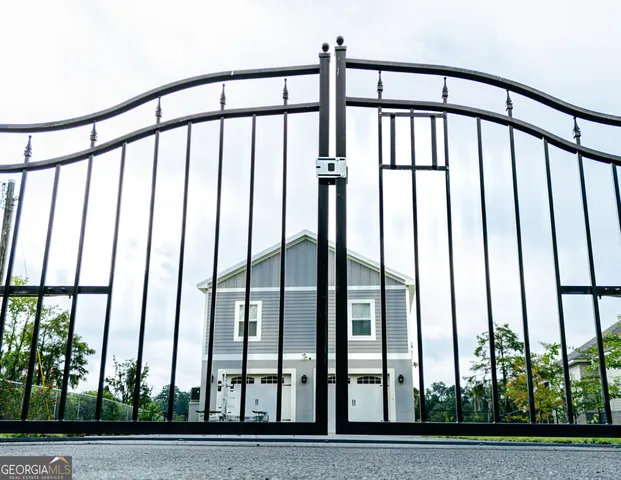 a view of staircase with lots of palm trees