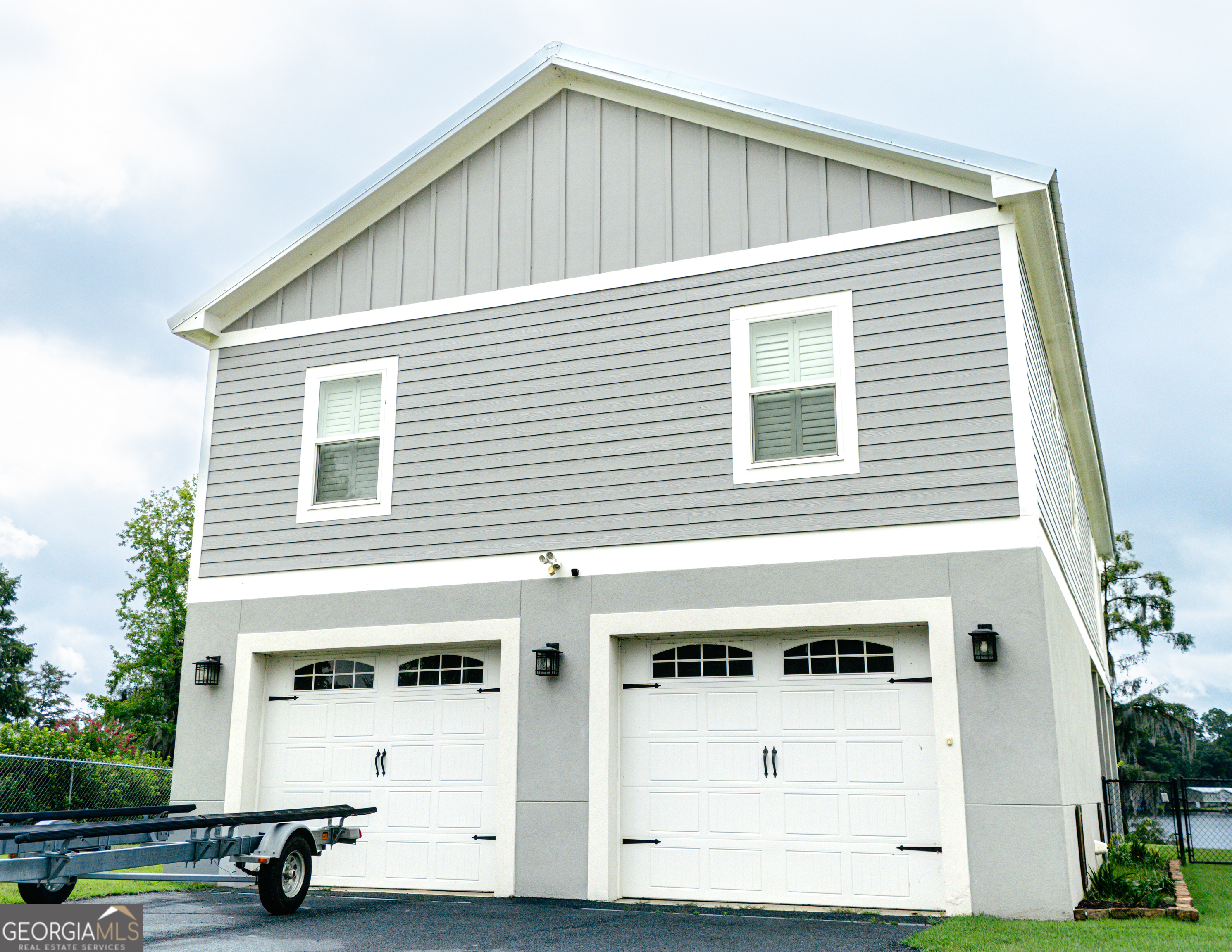 475 Cedar Creek Road North Cordele, GA 31015 - Photo 21 of 50 a front view of a building with parking