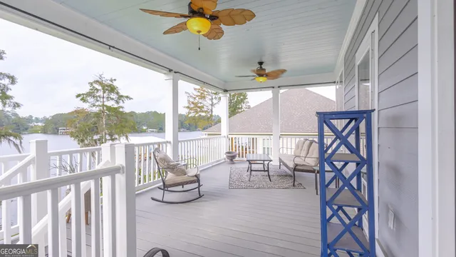 a view of a porch with furniture