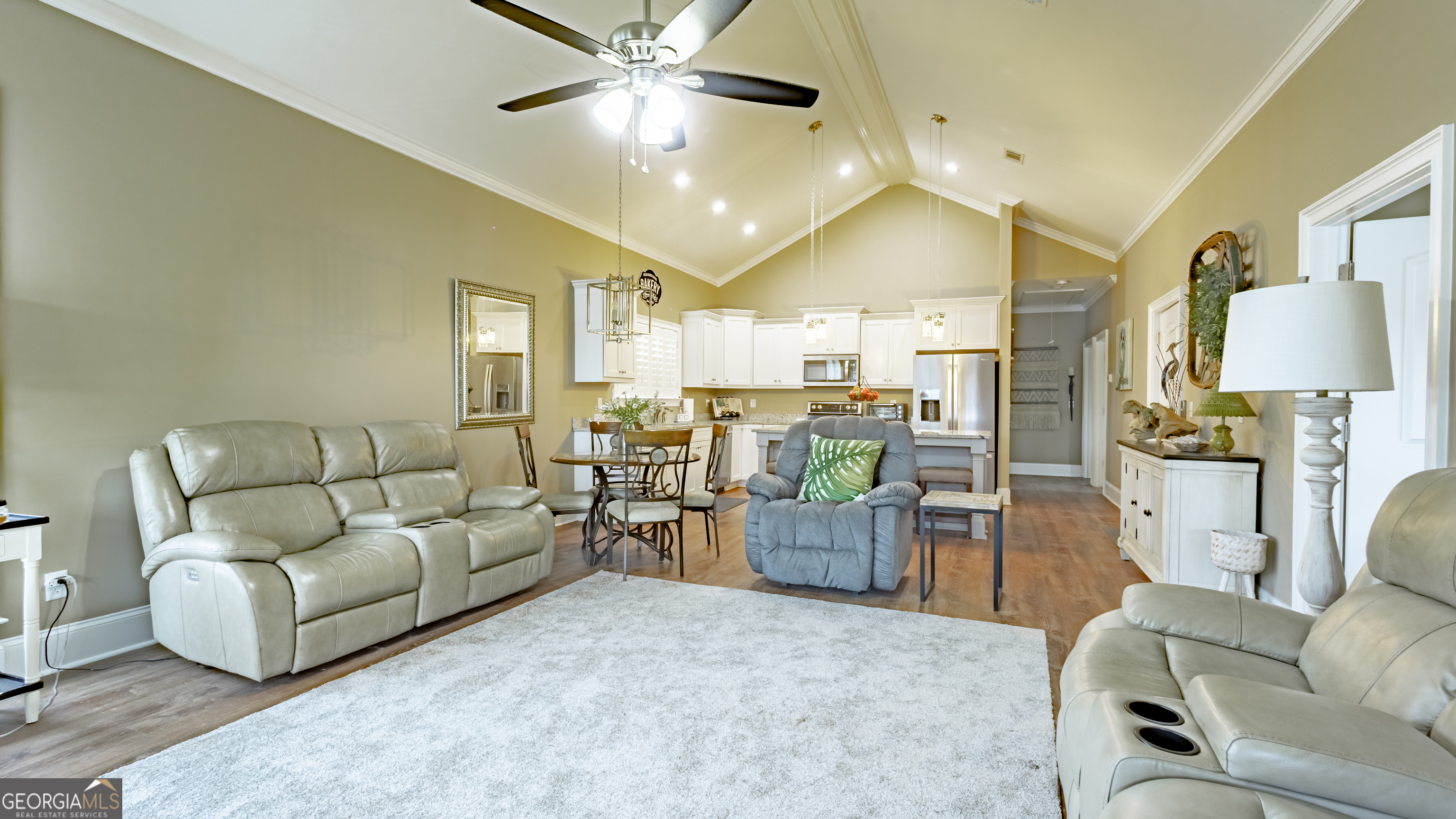 475 Cedar Creek Road North Cordele, GA 31015 - Photo 27 of 50 a living room with furniture and a chandelier
