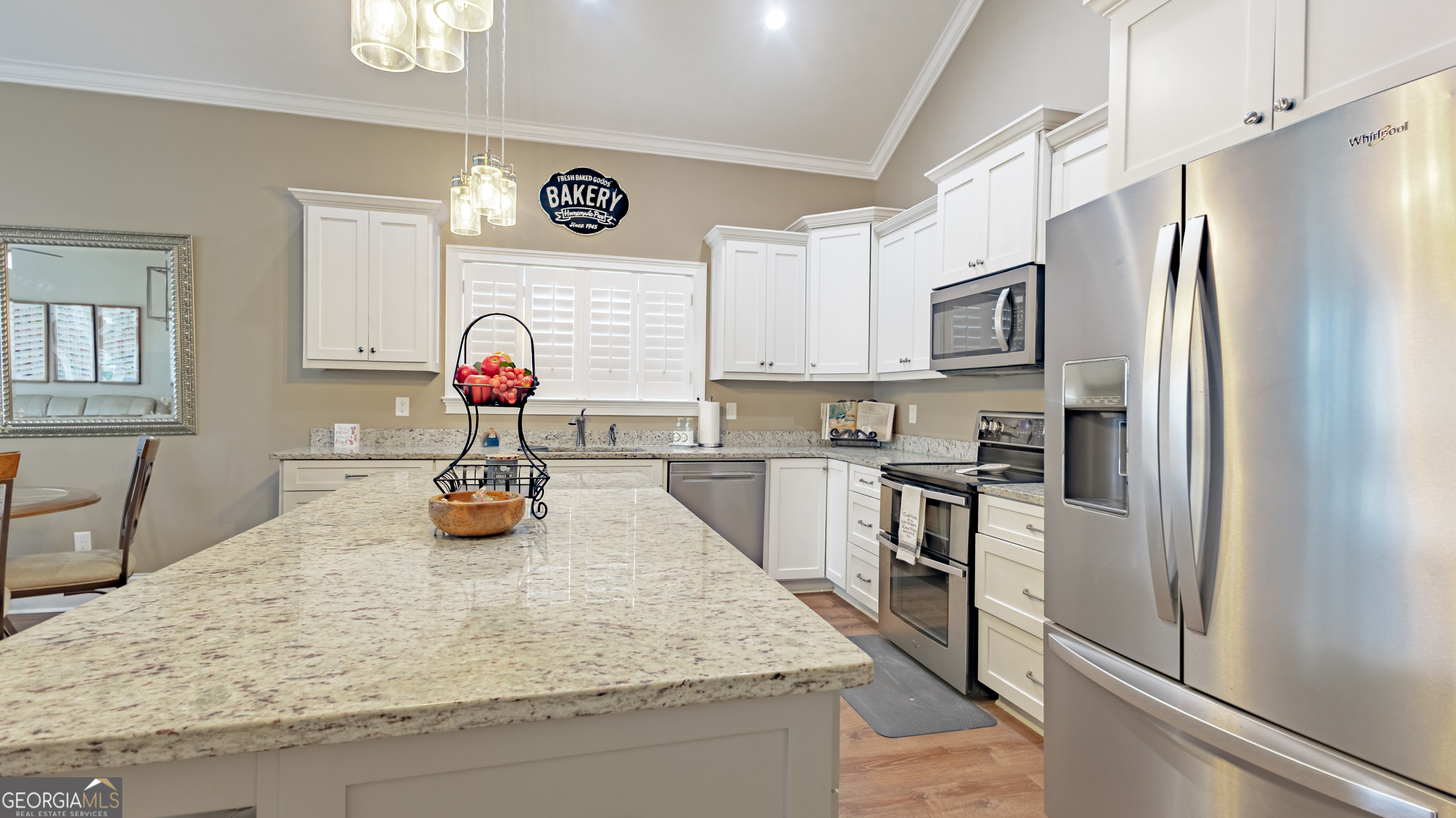 475 Cedar Creek Road North Cordele, GA 31015 - Photo 31 of 50 a kitchen with stainless steel appliances granite countertop a sink a stove and a refrigerator