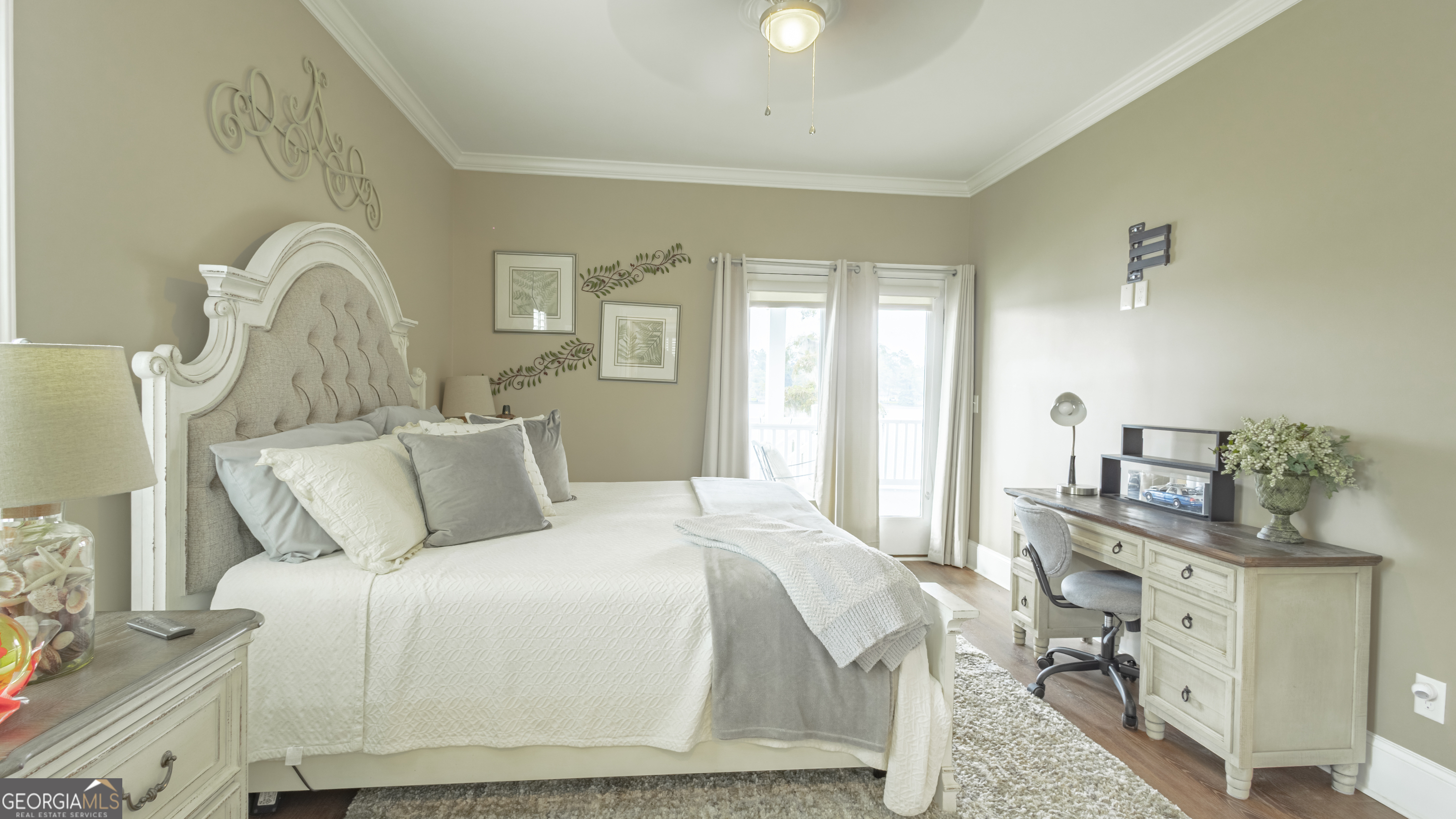 475 Cedar Creek Road North Cordele, GA 31015 - Photo 35 of 50 a bedroom with a bed and wooden floor