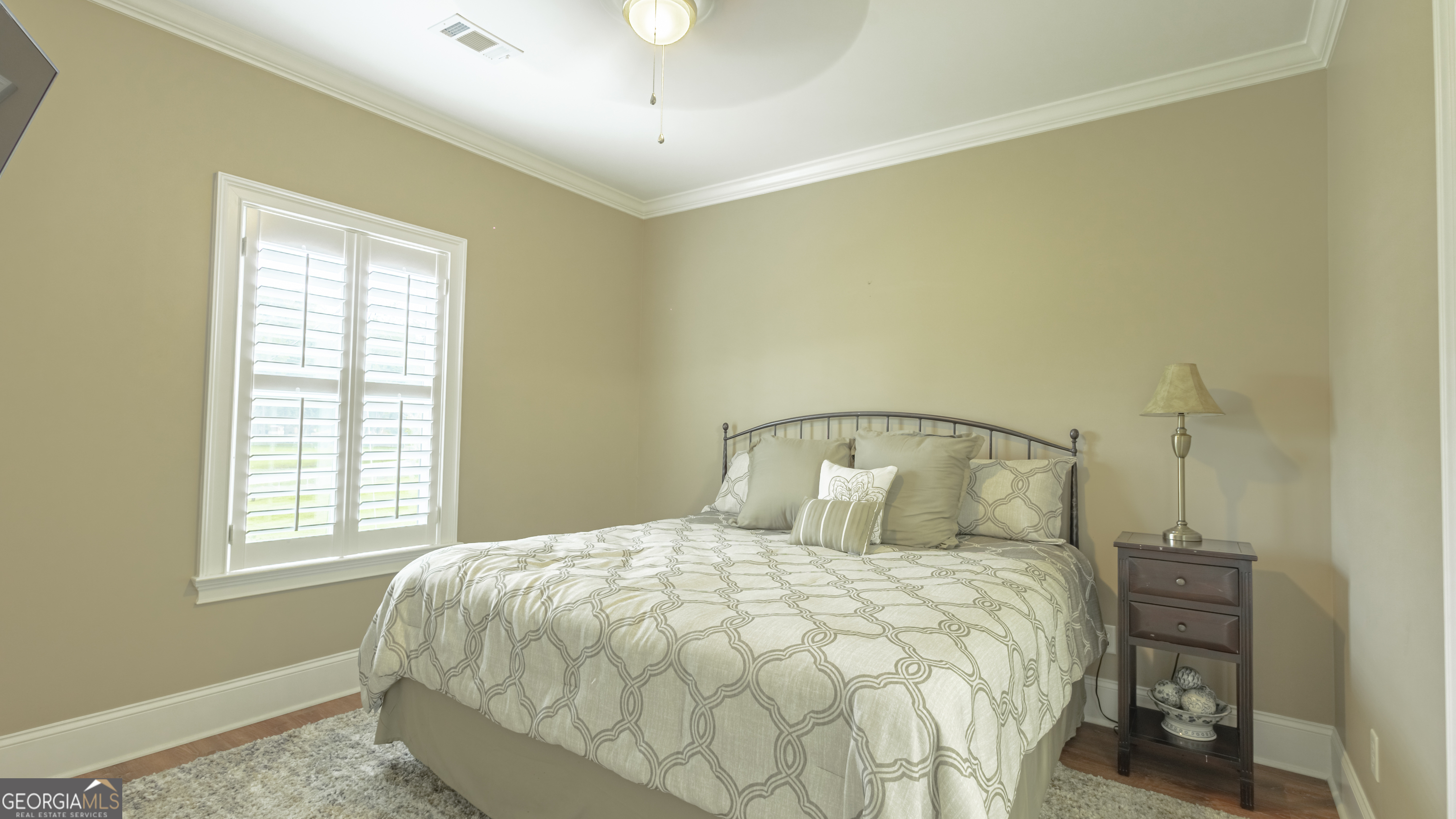 475 Cedar Creek Road North Cordele, GA 31015 - Photo 41 of 50 a bedroom with a bed and a window