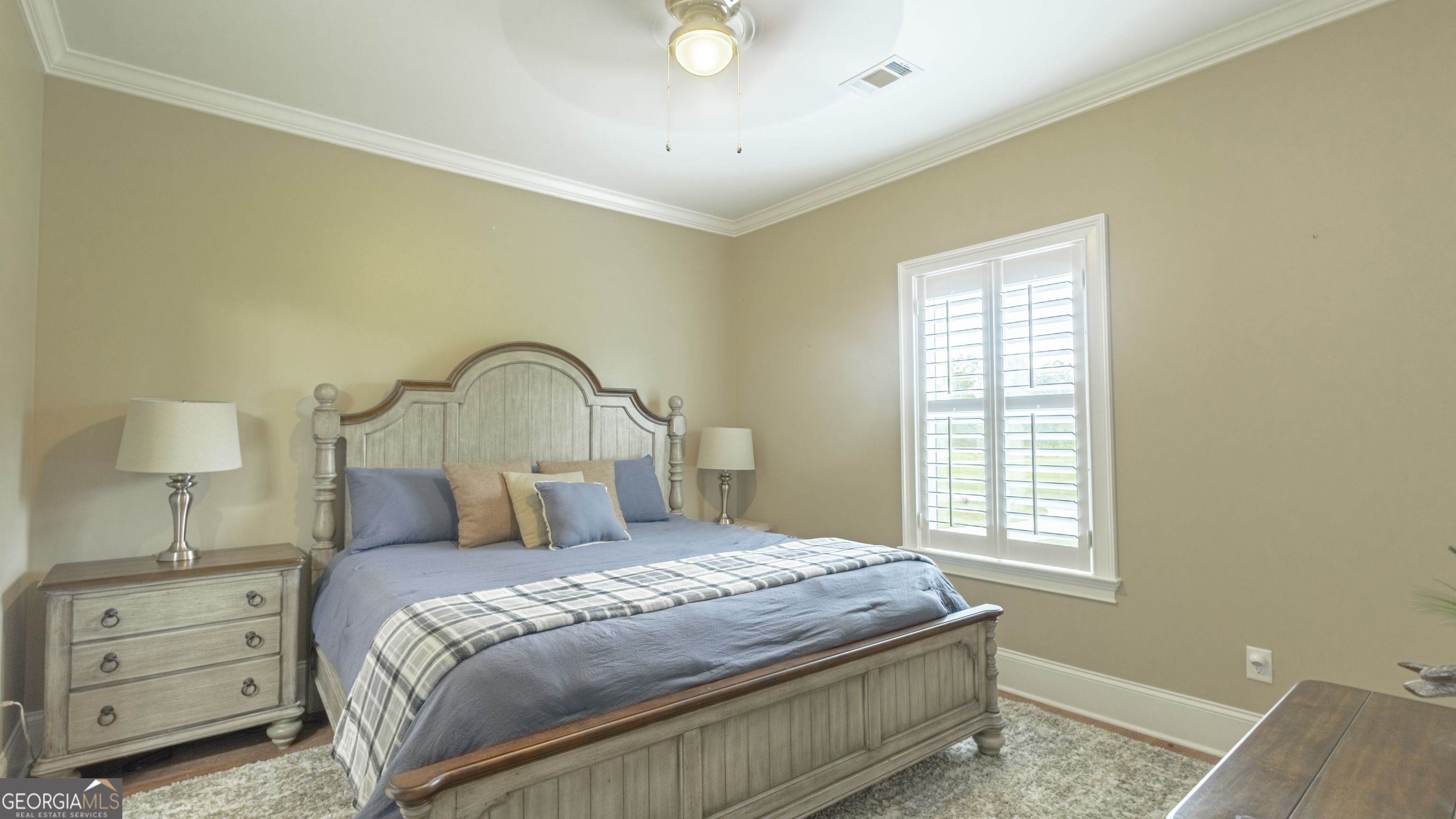 475 Cedar Creek Road North Cordele, GA 31015 - Photo 43 of 50 a bedroom with a bed and a window