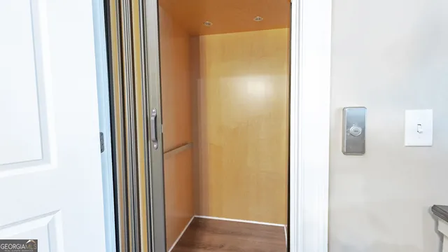 a view of a bathroom from a hallway