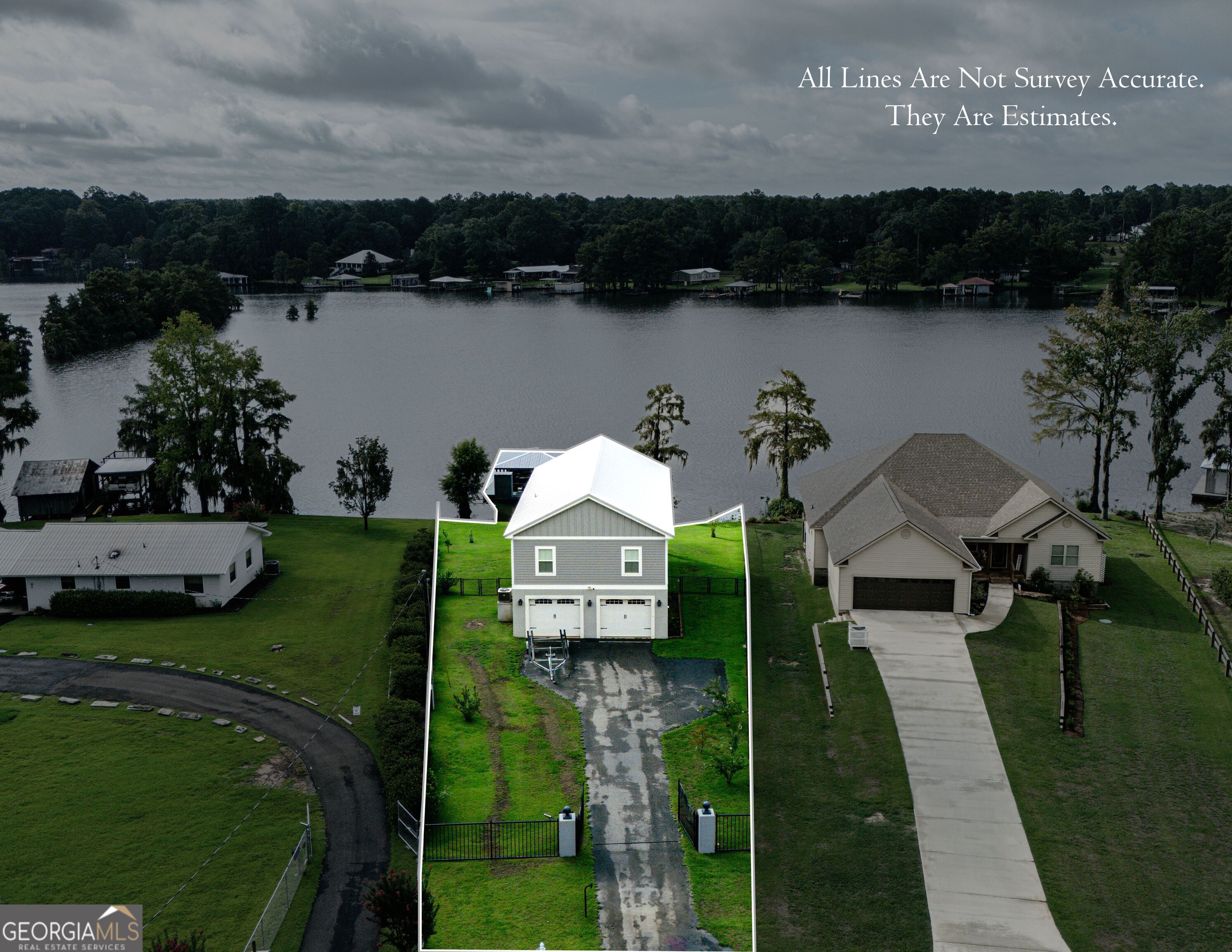 475 Cedar Creek Road North Cordele, GA 31015 - Photo 5 of 50 a view of a house with a yard and lake view
