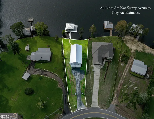 an aerial view of a house having yard