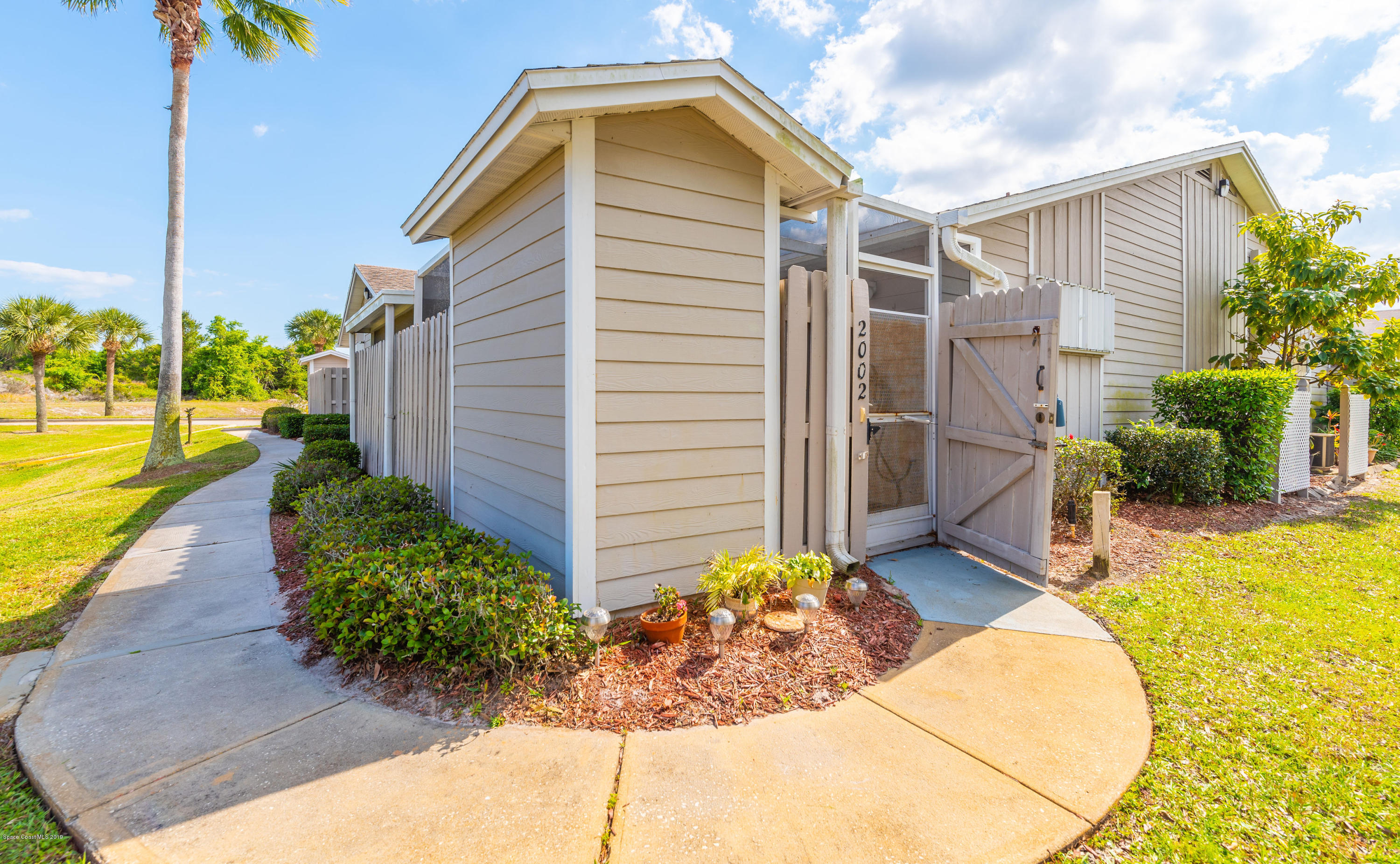 1918 Quail Ridge Court, Unit 2002 Cocoa, FL 32926 - Photo 2 of 32 1918QuailRidgeCtUnit2002(123of140)