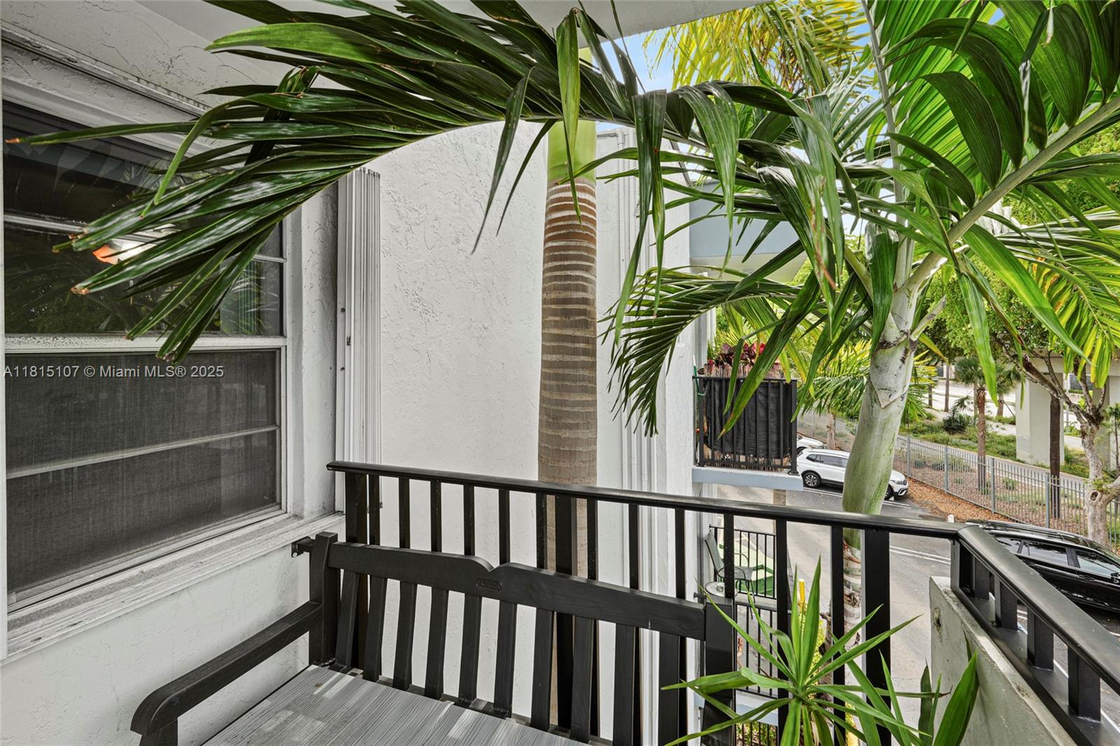 2498 Southwest 17th Avenue, Unit 4311 Miami, FL 33133 - Photo 17 of 19 a view of a balcony with plants