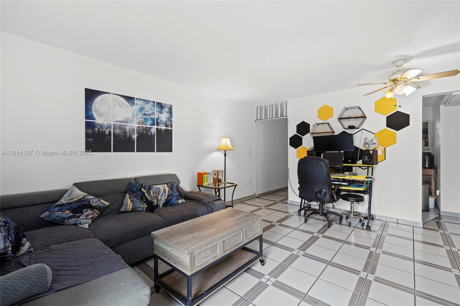 2498 Southwest 17th Avenue, Unit 4311 Miami, FL 33133 - Photo 2 of 19 a living room with furniture and wooden floor