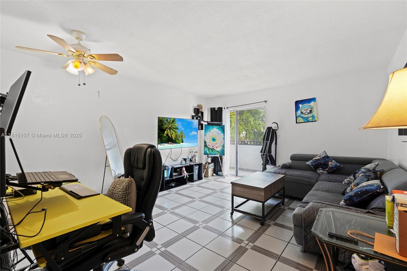2498 Southwest 17th Avenue, Unit 4311 Miami, FL 33133 - Photo 3 of 19 a living room with furniture and a window