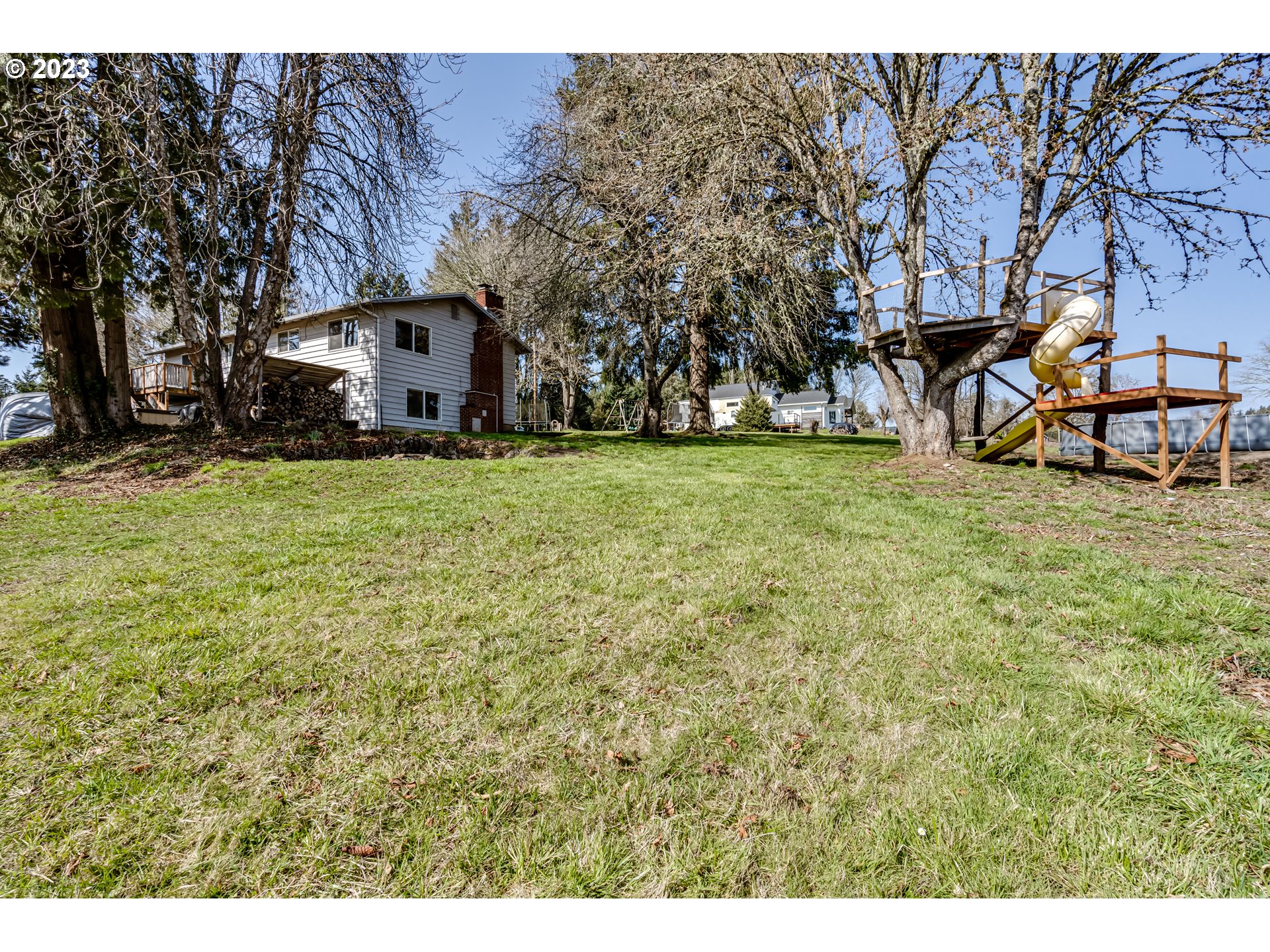 1109 Linda Lane Springfield, OR 97478 - Photo 29 of 30 a house with trees in front of it