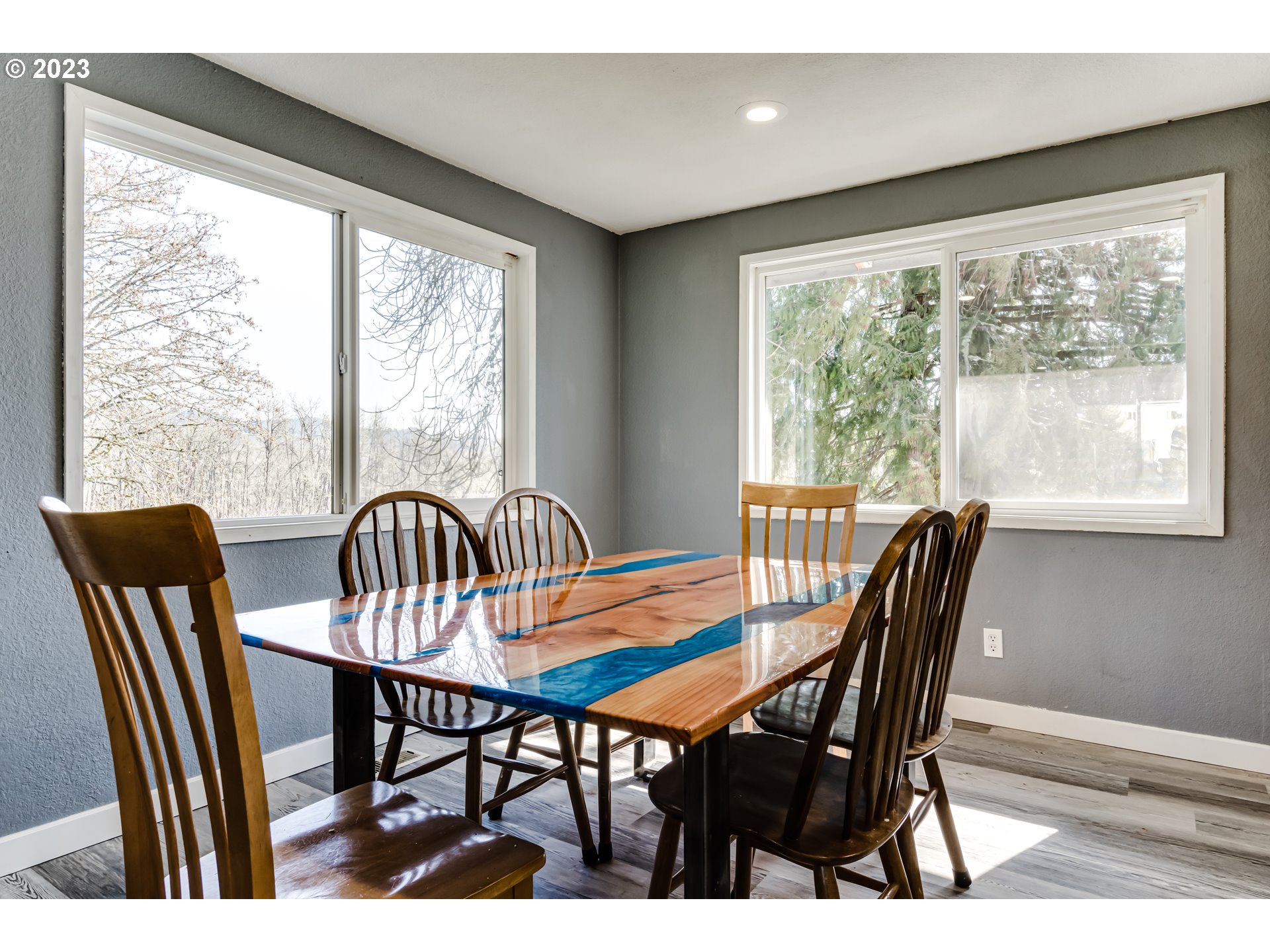 1109 Linda Lane Springfield, OR 97478 - Photo 8 of 30 a view of a dining room with furniture and a window