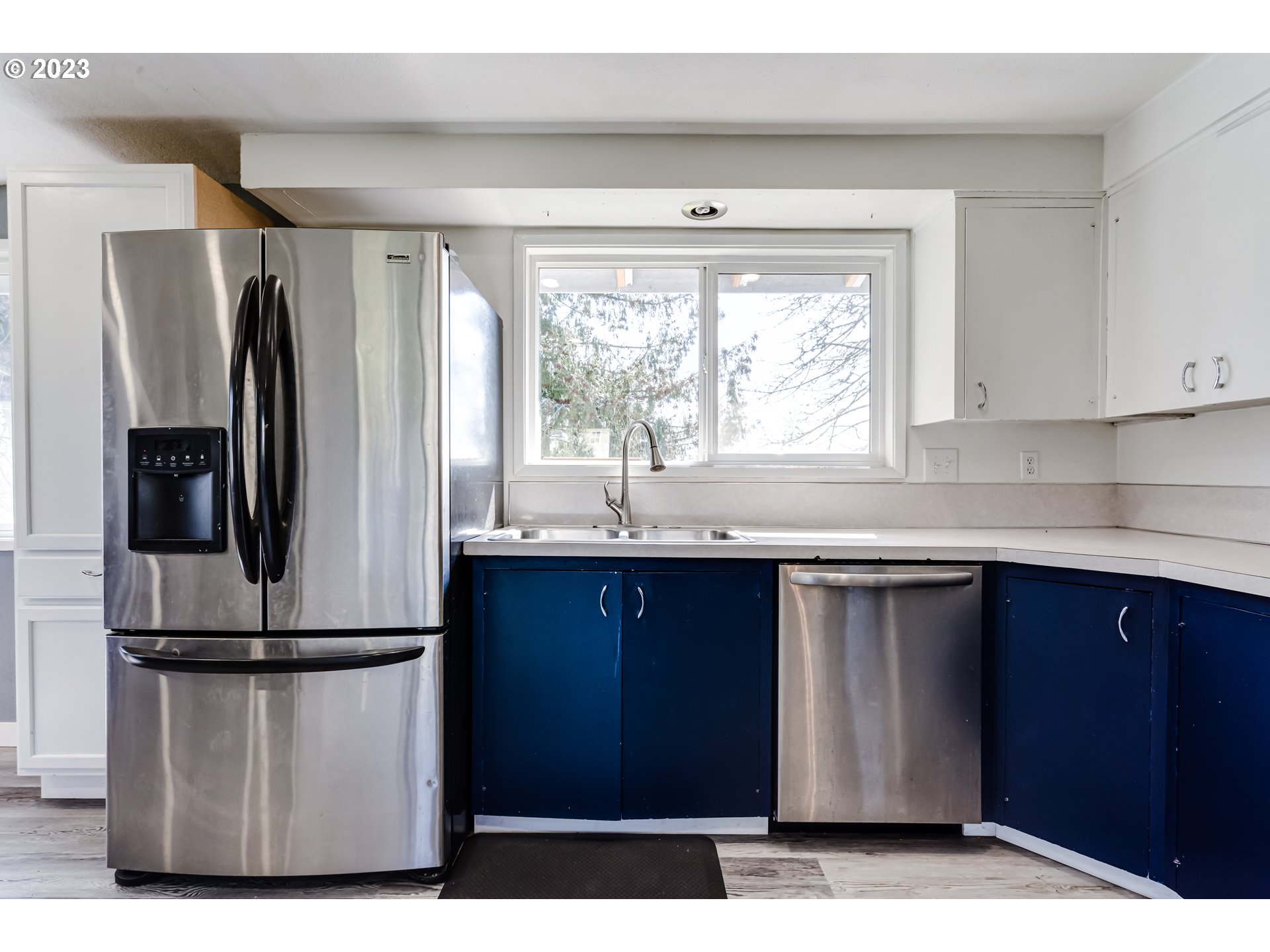 1109 Linda Lane Springfield, OR 97478 - Photo 10 of 30 a kitchen with a refrigerator and a sink