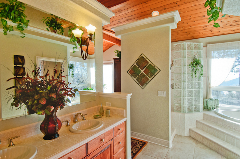 19200 Mountain Maple Road Lakehead, CA 96051 - Photo 13 of 36 a bathroom with a sink a mirror and a shower