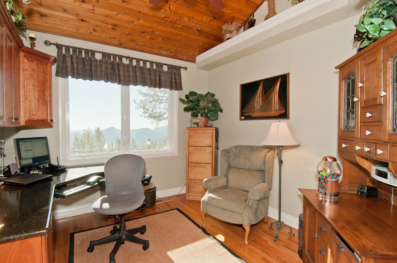 19200 Mountain Maple Road Lakehead, CA 96051 - Photo 16 of 36 a work room with furniture a rug and a window