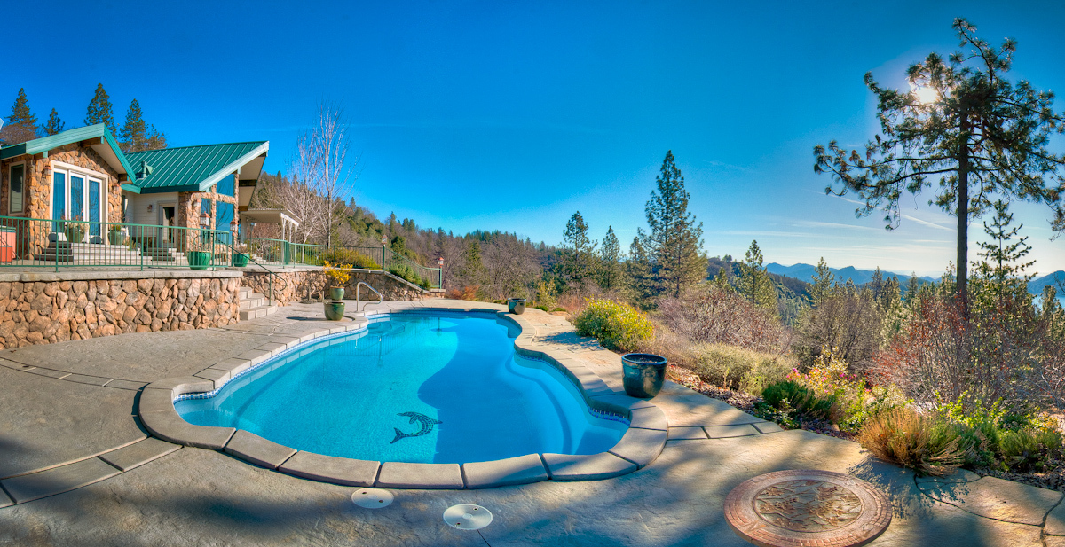 19200 Mountain Maple Road Lakehead, CA 96051 - Photo 27 of 36 a view of a swimming pool with a patio and a yard