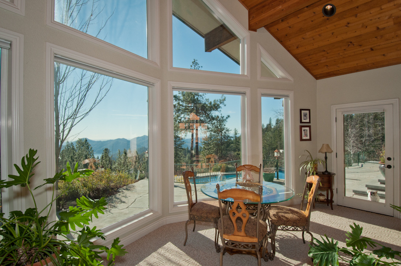19200 Mountain Maple Road Lakehead, CA 96051 - Photo 7 of 36 a balcony with furniture and a potted plant