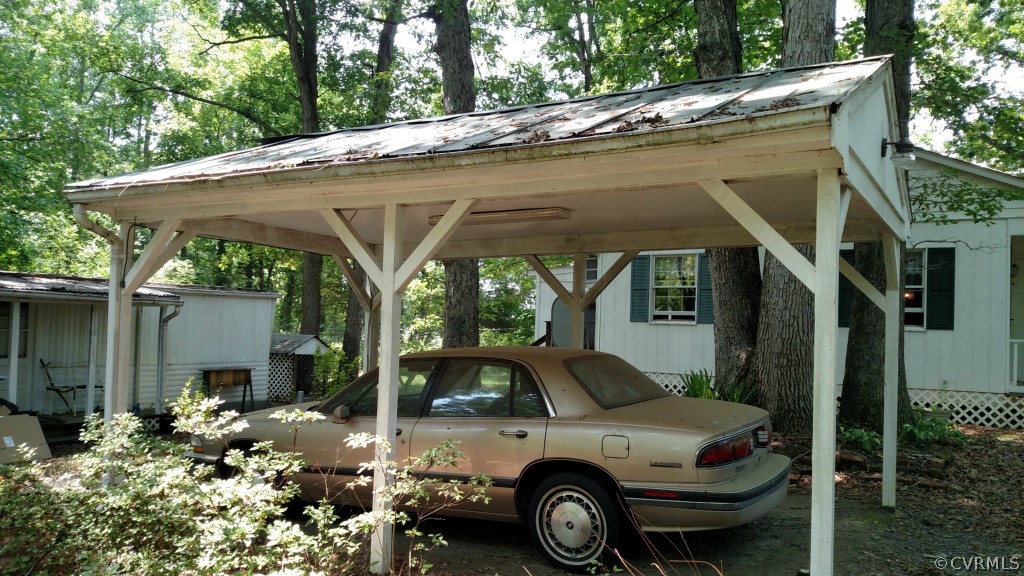 16397 Old Ridge Road Montpelier, VA 23192 - Photo 7 of 10 a view of a car parked in front of a house