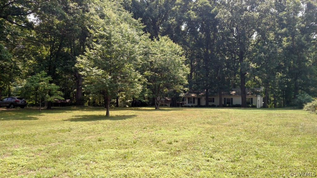 16397 Old Ridge Road Montpelier, VA 23192 - Photo 10 of 10 a view of a swimming pool with an outdoor space and seating area