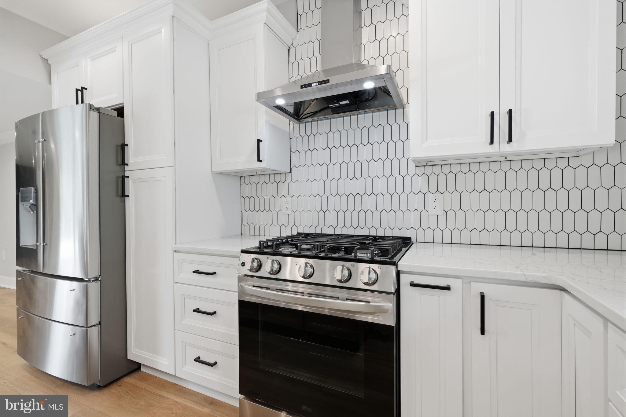 349 Andover Road Fairless Hills, PA 19030 - Photo 23 of 43 Sleek modern kitchen with chic tiles.
