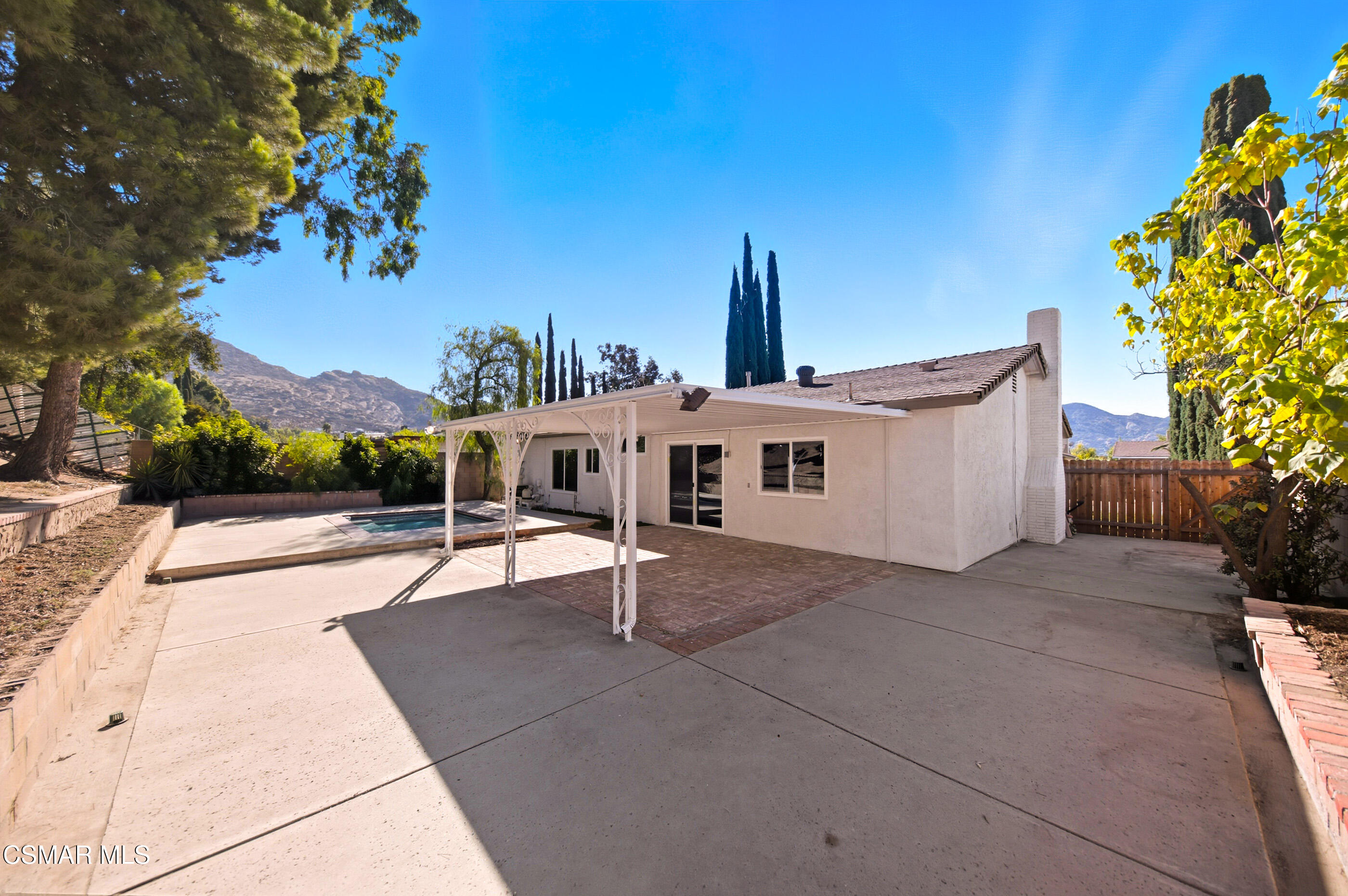 6417 Keystone Street Simi Valley, CA 93063 - Photo 15 of 31 a view of a house with backyard and a tree