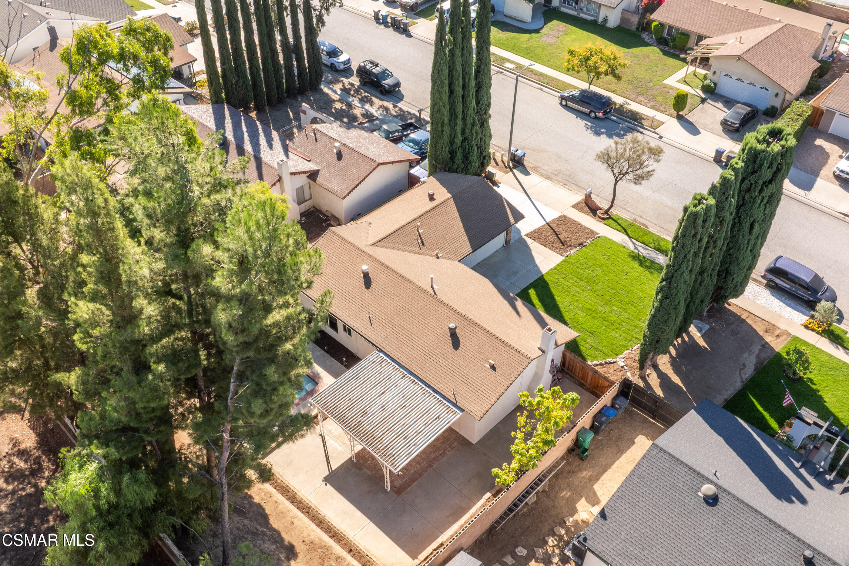 6417 Keystone Street Simi Valley, CA 93063 - Photo 28 of 31 an aerial view of a house with a garden and trees