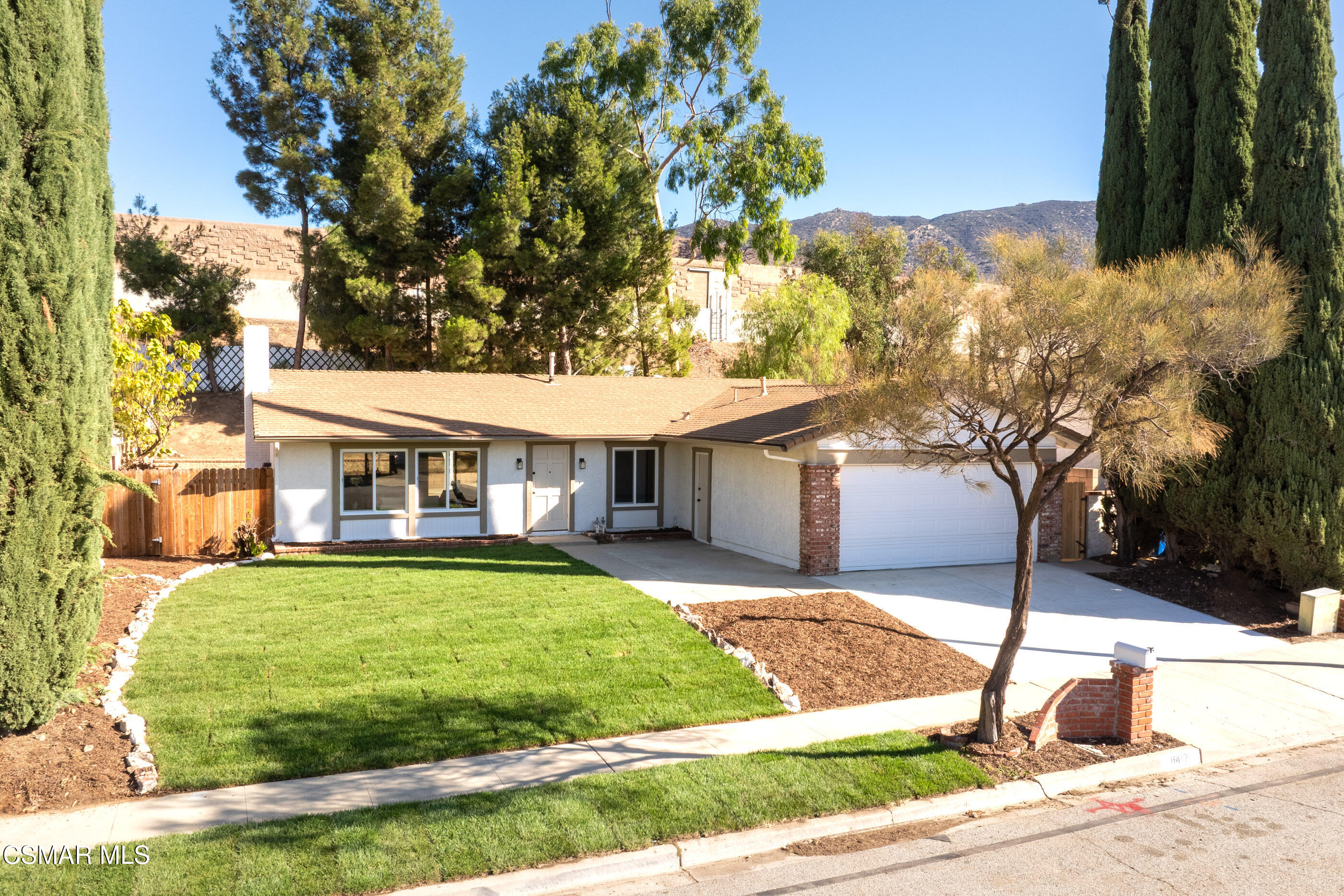 6417 Keystone Street Simi Valley, CA 93063 - Photo 29 of 31 a front view of house with yard and green space