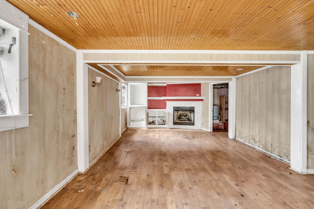 5800 Yellow Creek Road Murrayville, GA 30564 - Photo 8 of 29 a view of an empty room with a fireplace and a window