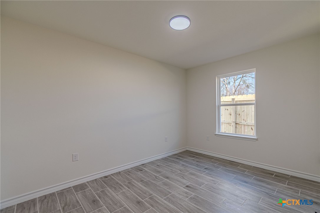 403 North Bauer Street Seguin, TX 78155 - Photo 15 of 27 an empty room with a window
