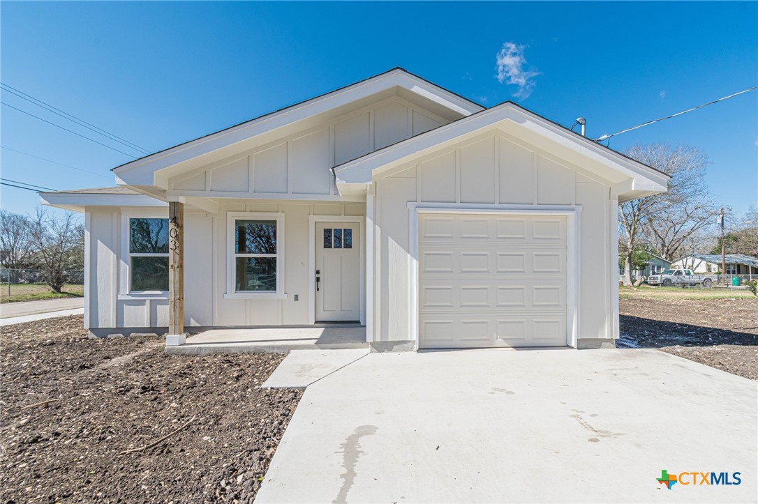 403 North Bauer Street Seguin, TX 78155 - Photo 26 of 27 a front view of a house with a yard