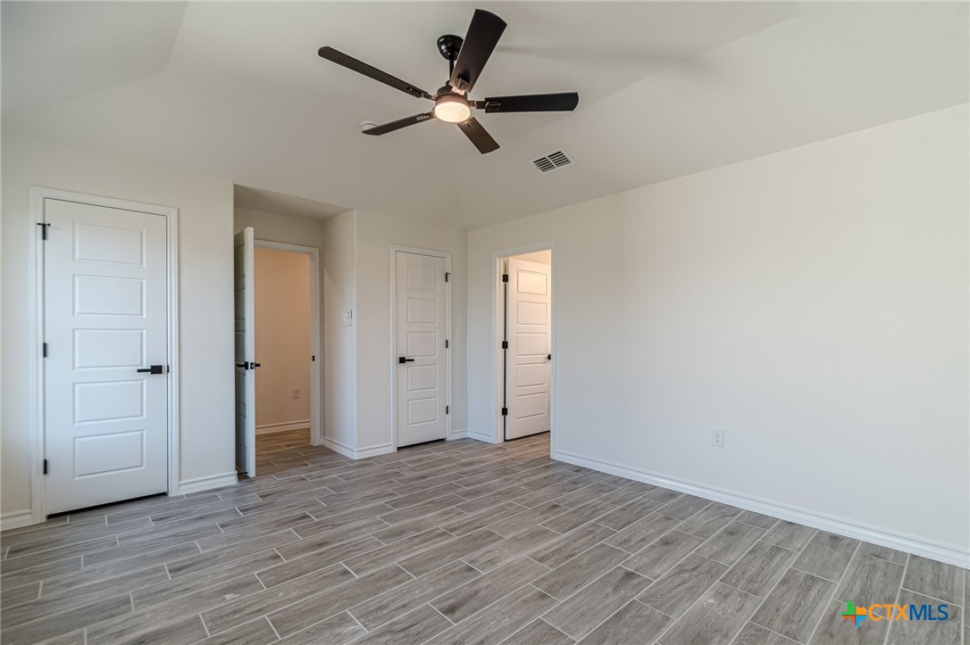403 North Bauer Street Seguin, TX 78155 - Photo 10 of 27 wooden floor in an empty room