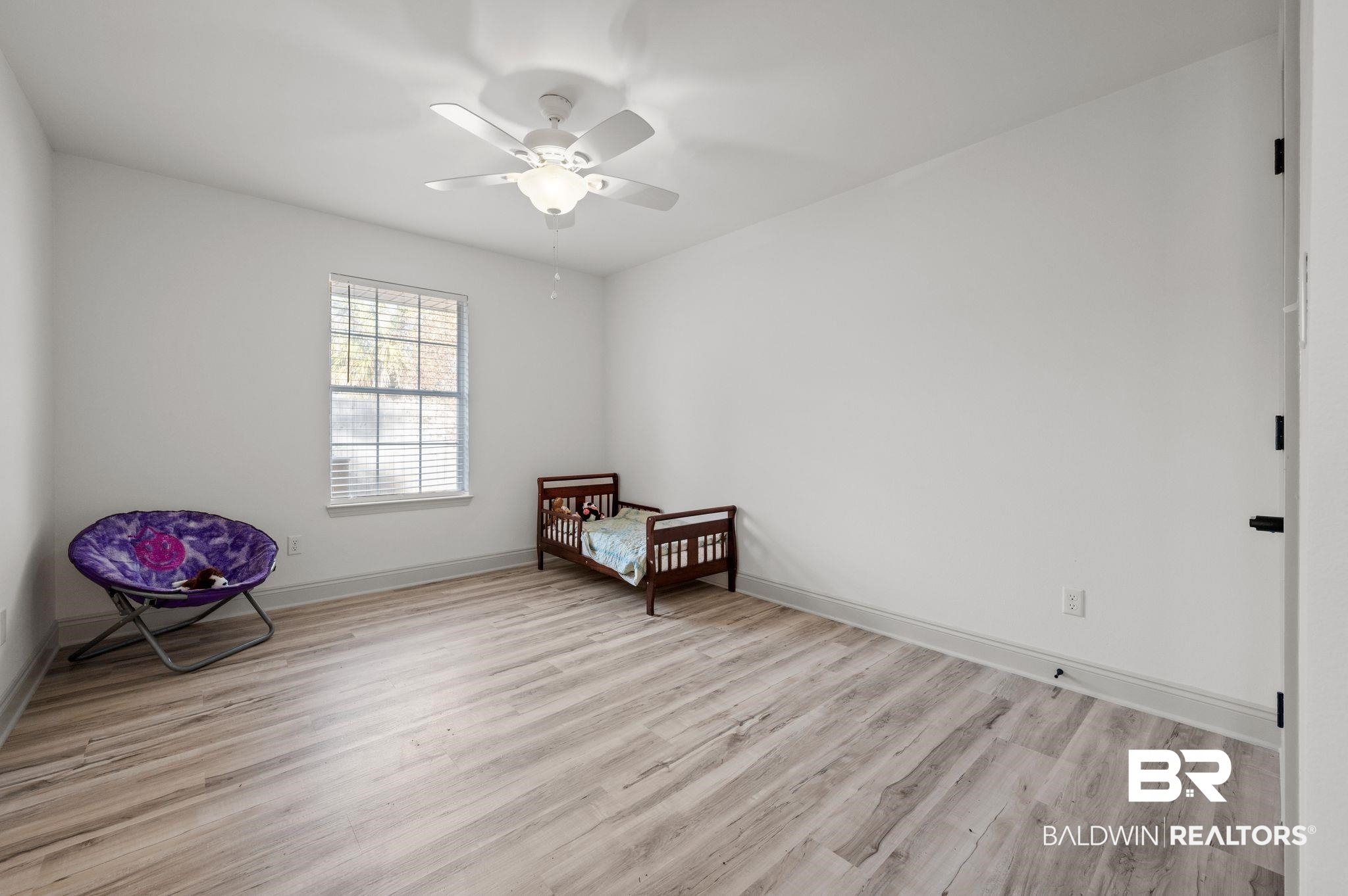 136 Destrehan Road Fairhope, AL 36532 - Photo 25 of 44 Unfurnished room featuring ceiling fan and light hardwood / wood-style flooring