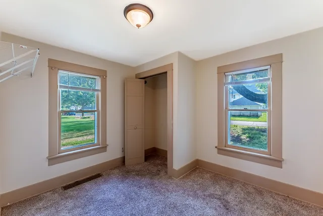 a view of an empty room with window