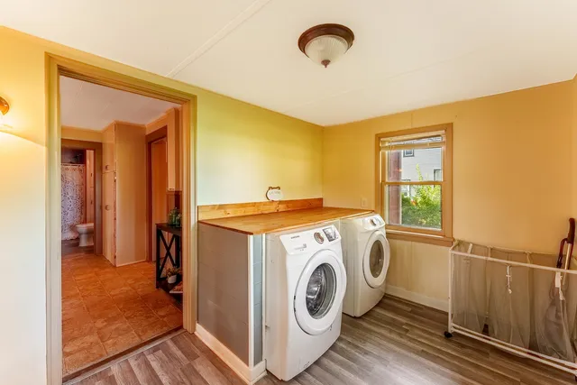 a utility room with dryer and washer