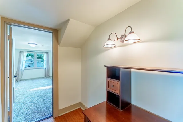 a view of entryway with wooden floor
