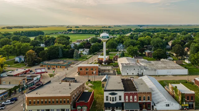 a view of an empty room and wooden floor