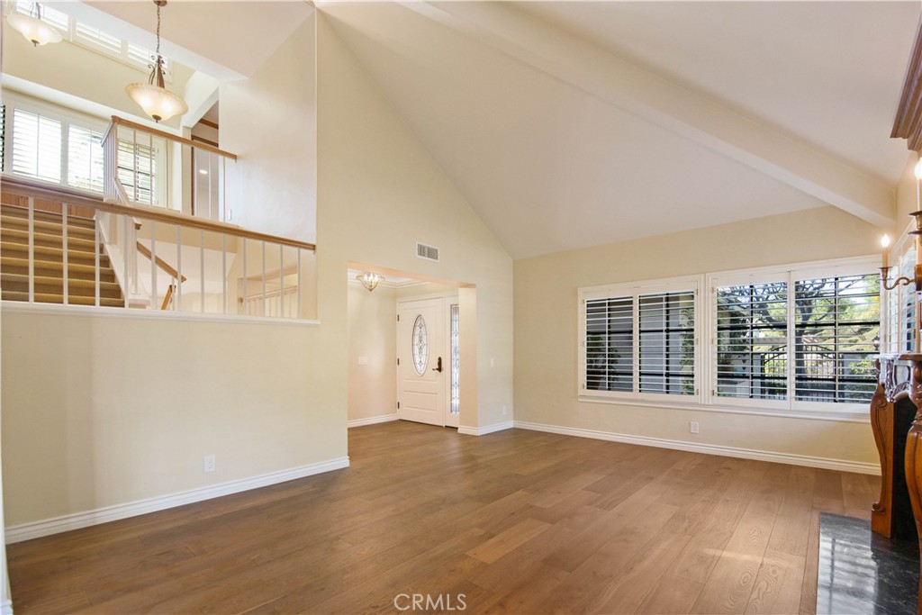 24965 Danamaple Dana Point, CA 92629 - Photo 20 of 72 an empty room with wooden floor and windows