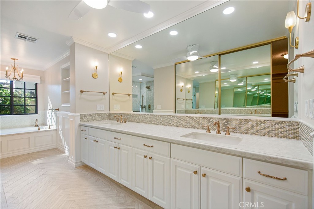24965 Danamaple Dana Point, CA 92629 - Photo 25 of 72 a bathroom with a granite countertop sink mirror and double