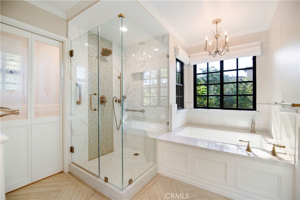 24965 Danamaple Dana Point, CA 92629 - Photo 26 of 72 a bathroom with a shower sink and mirror