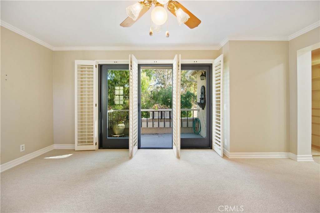 24965 Danamaple Dana Point, CA 92629 - Photo 32 of 72 a view of an empty room with a sliding door