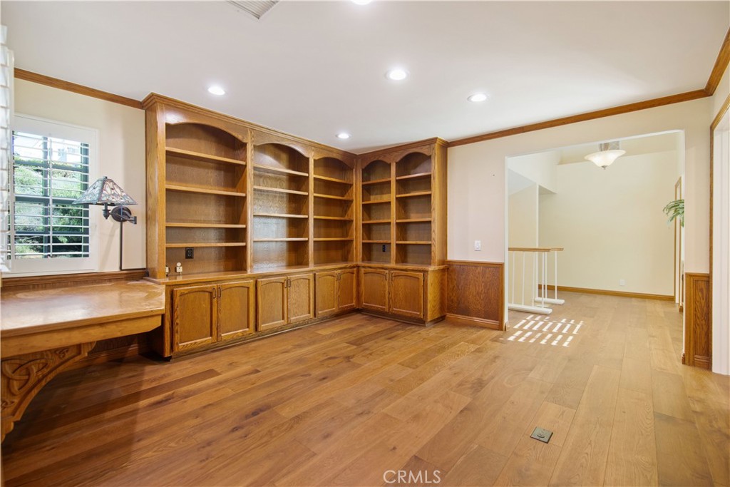 24965 Danamaple Dana Point, CA 92629 - Photo 44 of 72 a view of an empty room with a window and wooden floor