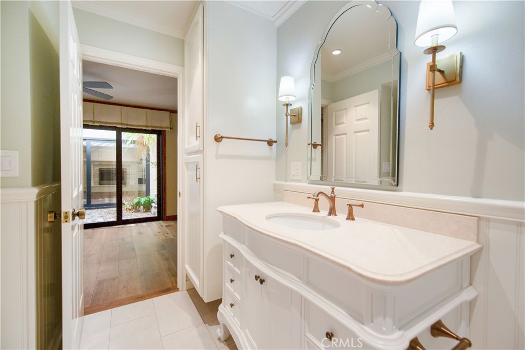 24965 Danamaple Dana Point, CA 92629 - Photo 47 of 72 a bathroom with a sink and a mirror
