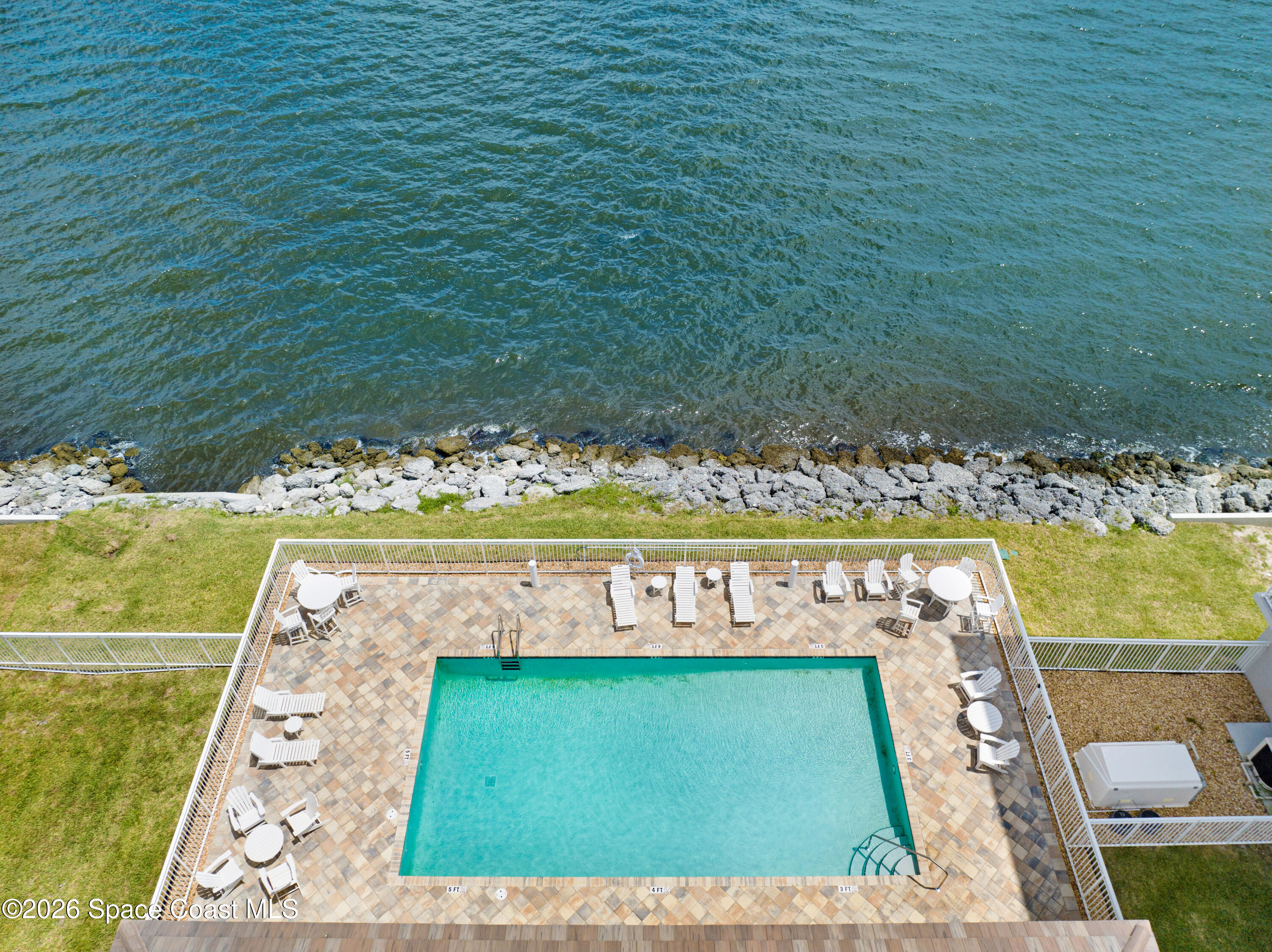 1805 Riverside Drive, Unit 304 Titusville, FL 32780 - Photo 11 of 46 a view of a swimming pool