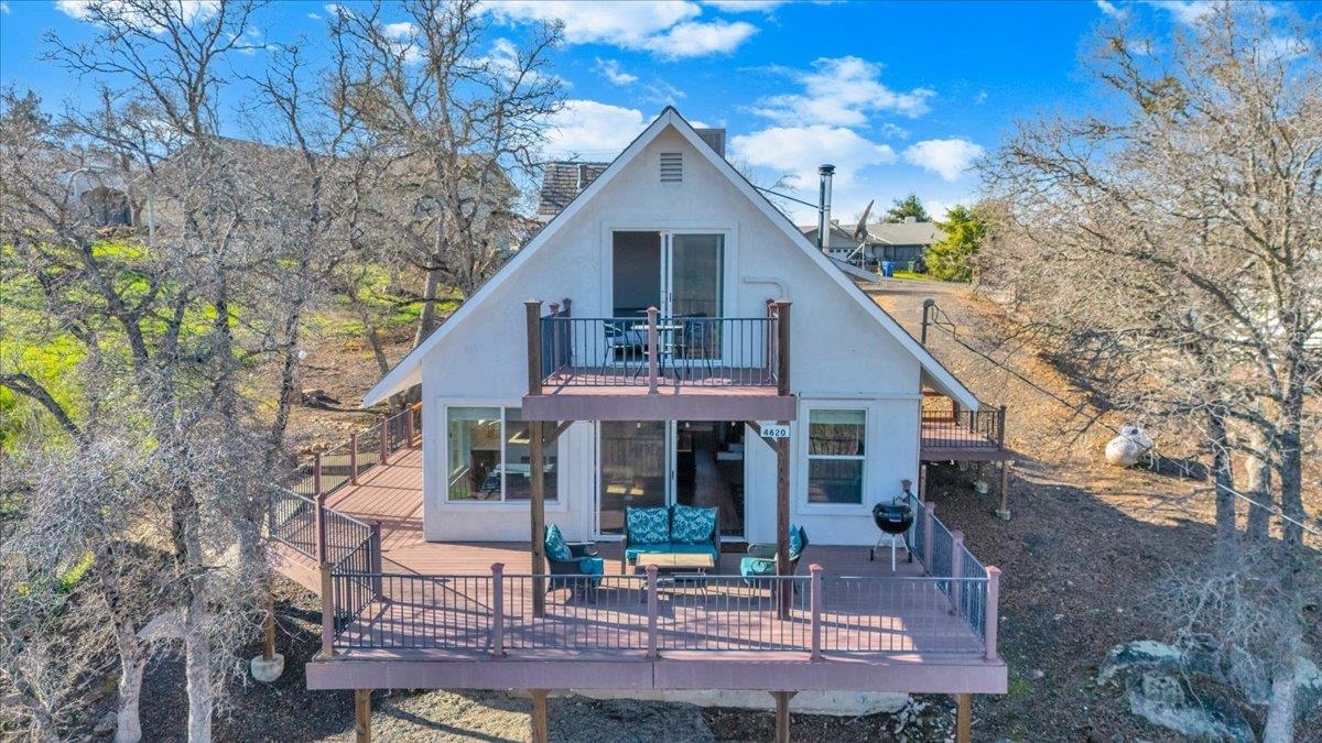 4620 Bayview Drive Copperopolis, CA 95228 - Photo 2 of 59 a front view of a house with garden